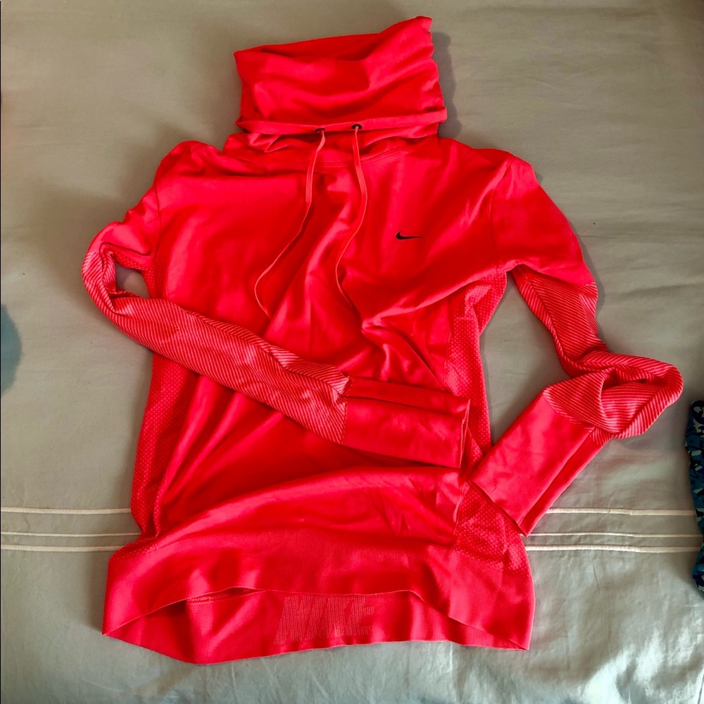 Nike dri-fit top size Medium. Never been worn.